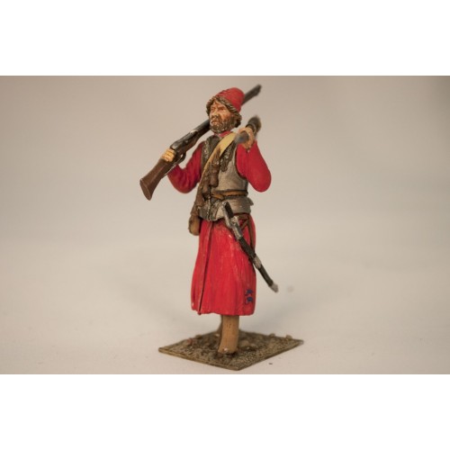 Стрелец в шапке, с бердышом и мушкетом на плечо